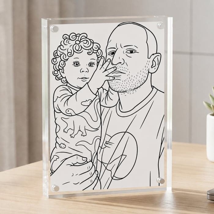 Clear acrylic frame with a coloring postcard inside, standing on a desk